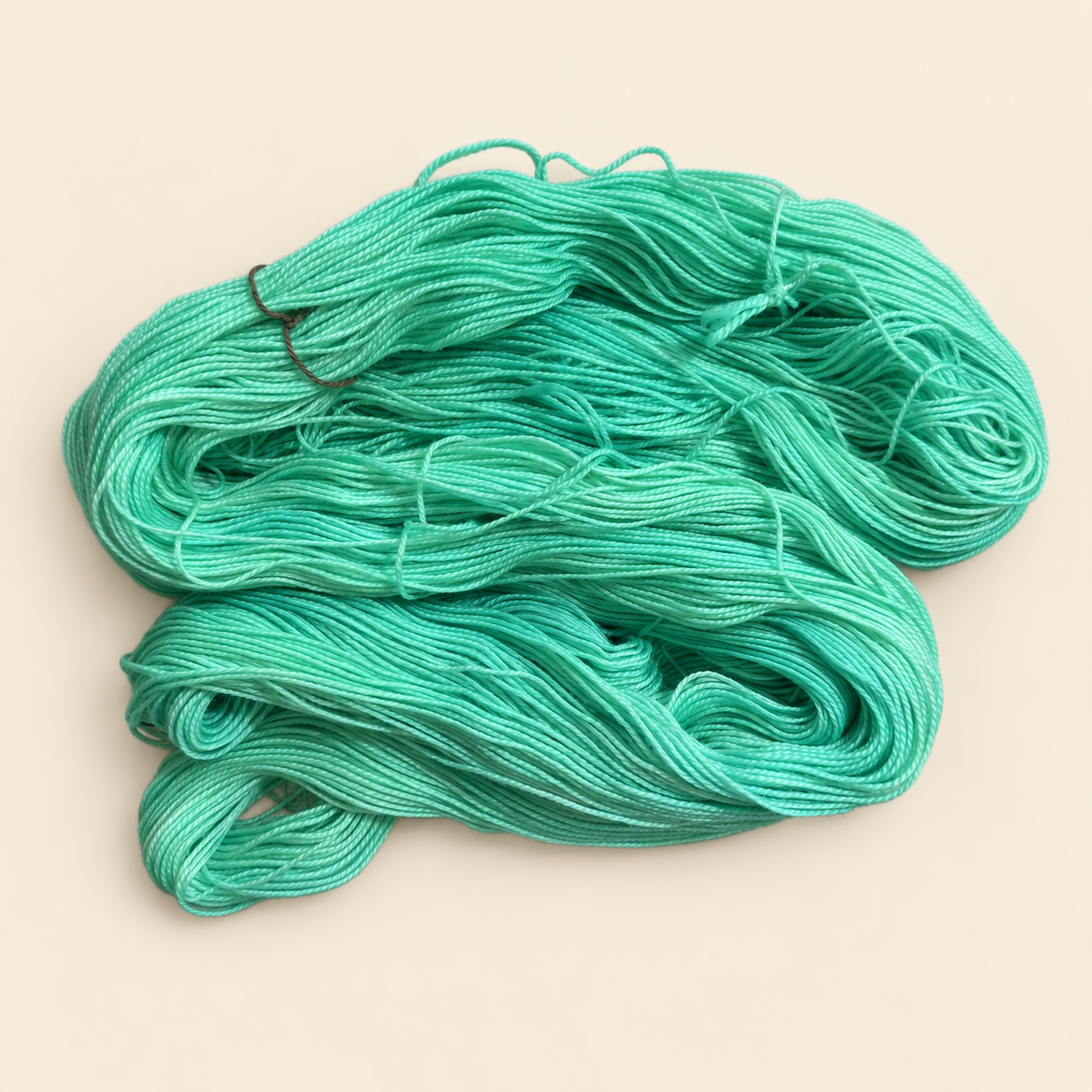 Into the deep is a bright blue-green yarn