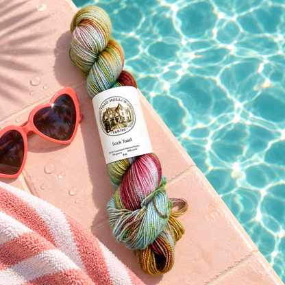 A skein of Kiss the Girls styled by the pool