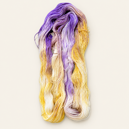 COLUMBINE Hand-dyed yarn - Cream, Purple & Yellow variegated yarn from the Road Trip Collection|Fingering, DK, Worsted, and Bulky Superwash Merino yarn| Toad Hollow Yarns